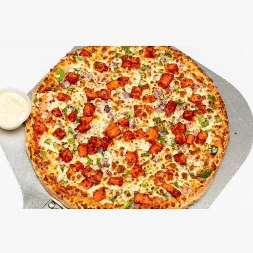 Chicken Tikka Pizza at The Kolachi Kitchen Downtown Winnipeg — halal fusion pizza